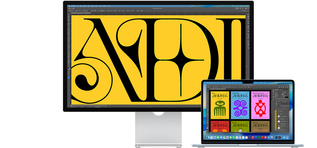 Un Studio Display et un ordinateur portable Mac affichant un projet en cours de réalisation dans plusieurs programmes Adobe, le Studio Display affiche en gros plan du texte noir sur fond jaune, le revêtement antireflet contribue à réduire les reflets