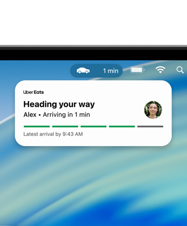 Top of Mac device screen showing the menu bar with an expanded Live Activity for Uber Eats