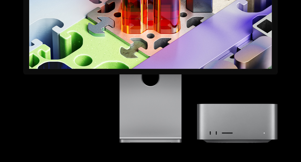 Mac Studio συνδεδεμένο με Studio Display XDR, η συσκευή τοποθετημένη κάτω από την οθόνη: το Studio Display XDR με τρισδιάστατη ταπετσαρία σαν παζλ